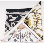 A collection of three Hermes print silk scarves, comprising: a 'Les Parure du Vent' designed...