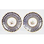 A pair of English porcelain plates or stands, possibly Samuel Alcock, circa