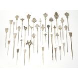 A collection of thirty-seven plated skewers, in a variety of designs, (37) Part 7087