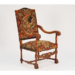 A Louis XIV style beech framed high back open armchair, on paw feet, 66cm wide x 118cm high.