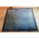 A plain blue machine made carpet, with three outer lines, 397cm wide x 342cm long