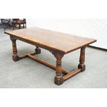 A 17th century style oak refectory table.