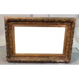 A Victorian rectangular gilt gesso frame