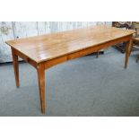 A 19th century French cherrywood plank-top kitchen table