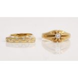 An 18ct gold and diamond single stone ring, claw set with a cushion shaped diamond, London...