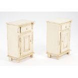A pair of cream painted pine bedside tables, each with a single drawer over cupboard, 48cm...
