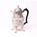 A silver hot water jug, the body decorated with animals, floral sprays and foliate scrolls,...