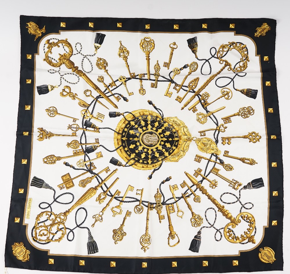 A collection of three Hermes print silk scarves, comprising: a 'Les Parure du Vent' designed... - Image 5 of 5