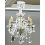 A glass five-light chandelier