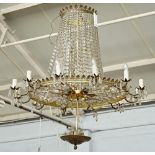 A Regency style gilt metal and cut glass twelve-light chandelier