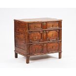 A Charles II oak chest of three long graduated moulded geometric drawers, 79cm wide x 77cm high.