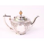 A Victorian silver teapot, embossed with foliate scrolls and flowers and with an urn shaped...