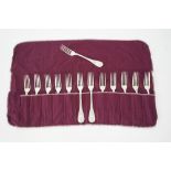 Thirteen French table forks,