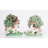 A pair of Derby porcelain figures of a stag and doe, circa 1765-70, each modelled recumbent...