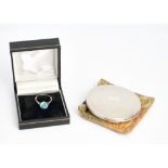 A blue zircon single stone ring, claw set with a circular cut blue zircon, ring size Q, (note...