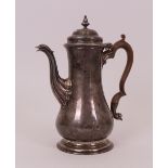 A late George II silver coffee pot, of baluster form, with a replacement wooden handle