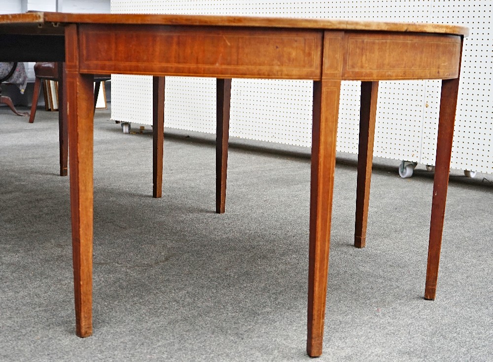 A George III inlaid mahogany 'D' end extending dining table with three extra leaves on... - Image 7 of 8