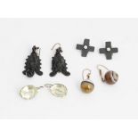 A pair of banded agate bead earrings, the tops with hook fittings, a pair of black composition...