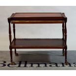 A late 19th century French mahogany and brass bound folding two tier trolley