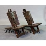 A pair of early 20th century African folding chairs, 33cm wide; 78cm high (2) 5980