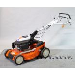 A Stihl RM 650V petrol mower.