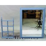 A modern blue painted rectangular mirror