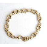 A 9ct gold bracelet, in a multiple link design, on a sprung hook shaped clasp, length of...