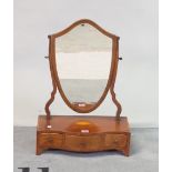 A George III mahogany and satinwood banded serpentine dressing table mirror with three frieze...