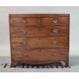 A George III mahogany bowfront chest of two short and three long graduated drawers,
