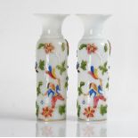 A pair of Continental opaline glass cylindrical vases, probably French or Bohemian, late 19th...