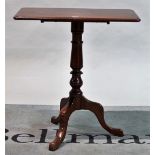 A 19th century tripod table, 85cm wide