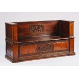 A 17th century and later Italian walnut box seat square back settle with lift arms and seat,...
