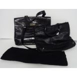 A Donna Karen New York black leather crocodile effect work bag and a black ostrich tote bag by...