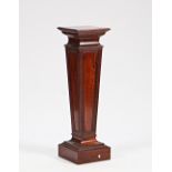 A mahogany jardiniere stand of tapering square form with blind fret decoration, 112cm wide x...