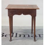 An 18th century and later oak side table on pad feet