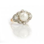 A cultured pearl and diamond-set dress ring, of lozenge design, the central cultured pearl...