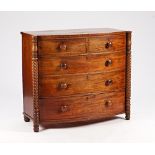 A Regency mahogany bowfront chest of two short and three long graduated drawers, flanked by...