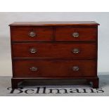 A 19th century mahogany chest of two short and two long drawers on bracket feet