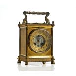 A French gilt brass cased goliath carriage clock