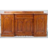 A 19th century mahogany mirrored breakfront sideboard with single drawer flanked by arched...