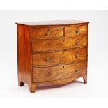 A Regency mahogany bowfront chest with two short and three long graduated drawers on bracket...