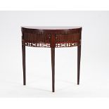 An 18th century Dutch mahogany demi-lune tea table with tambour frieze panels on tapering...