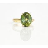 An 18ct gold and andalusite single stone ring.