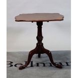 An 18th century and later mahogany occasional table