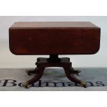 A George III mahogany drop flap centre table