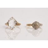 A gold and diamond set cluster ring, mounted with circular cut diamonds, detailed 18 CT, ring...
