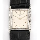 A Patek Philippe, Geneve diamond set rectangular cased wristwatch, the signed rectangular...