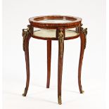 A late 19th century French walnut and kingwood circular bijouterie table.