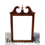 A modern stained beech wall mirror