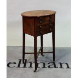 A George III and later mahogany sewing table with an oval lift top over two short drawers on...